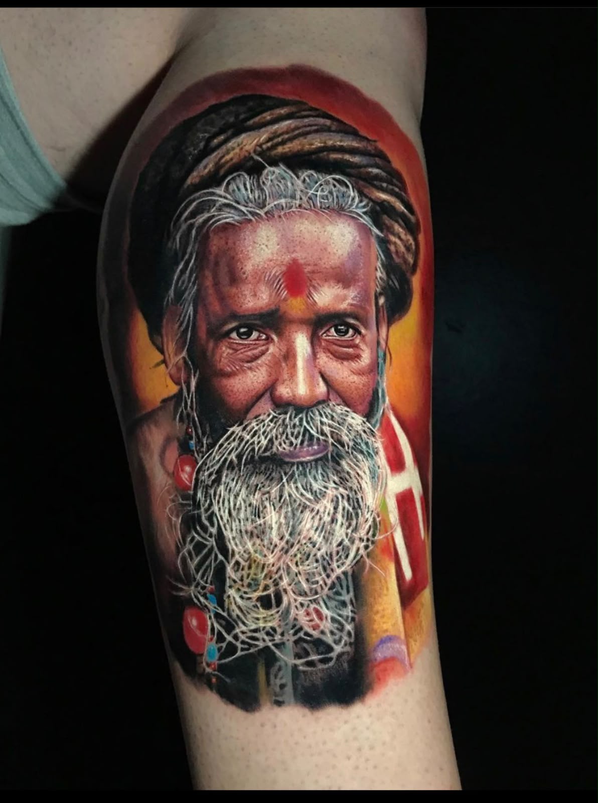 Tatuagem Realismo Sadhu na região braço feita por Bagé em Porto Alegre