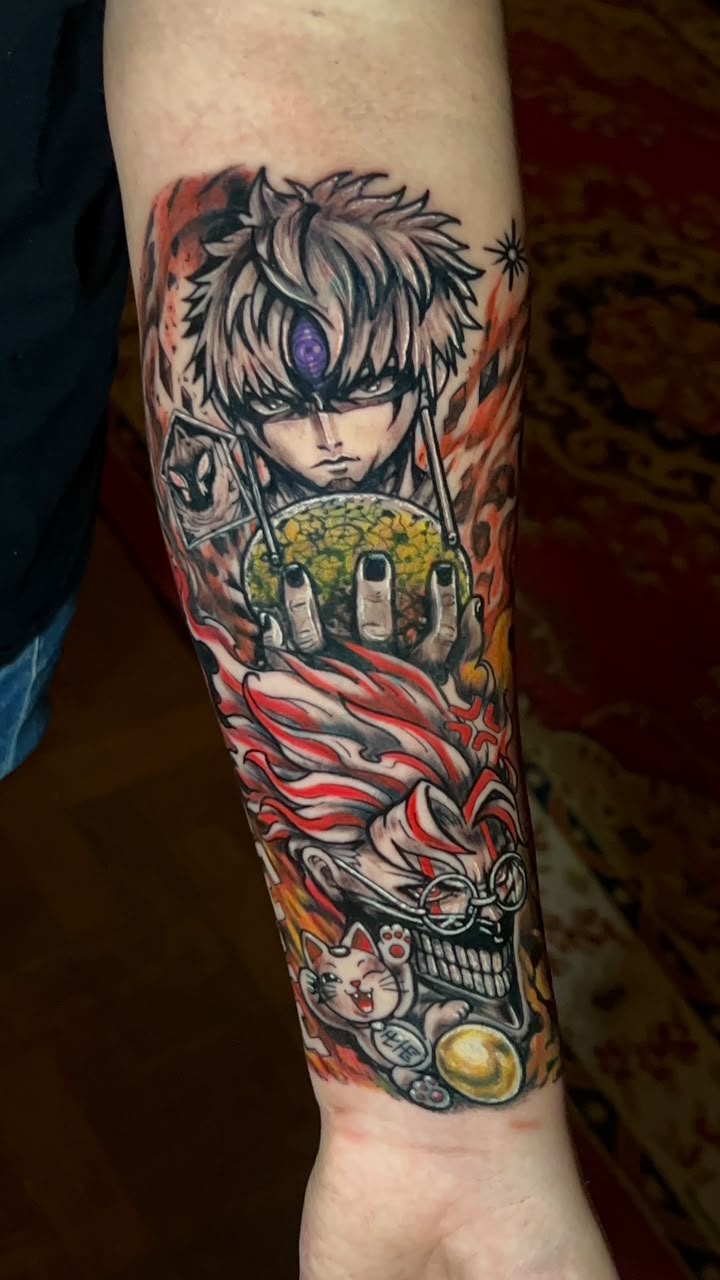 Tatuagem Anime Chamas do Anime na região antebraço feita por Simone Centeno em Porto Alegre